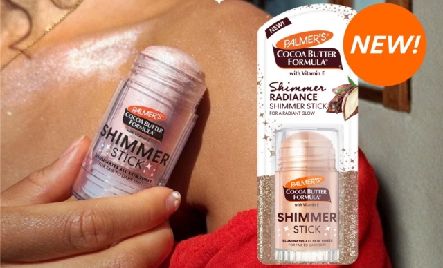 A woman's hand applies Palmer's Cocoa Butter Shimmer Stick to her shoulder, highlighting a radiant glow. The product packaging is shown nearby.